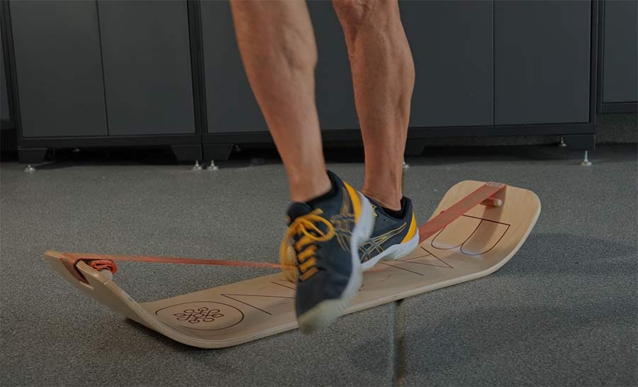 man using the giboard to train his balance for wing foiling